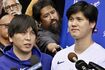 大谷翔平（右）と元通訳の水原一平氏　写真／共同通信社