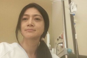 抗がん剤治療で入院中のたむらさん。病室で息子に絵本を読むのが唯一の楽しみだった