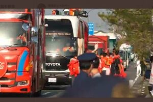 聖火リレーと共に全国を回るキャラバン隊(インターネットより)