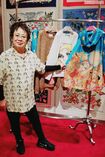 2018年、GUCCIの服の前で。発表されるや否や世界中で即、完売状態だったそう