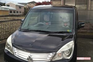 金城え夢容疑者の車にはキャラクターのクッションが置かれている