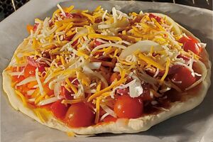 初めてピザ生地からやってみました。大セイコー。旦那は明日も食べる~!!って。明日は庭のチムニィ~で焼いてみる~」(2021年1月17日)