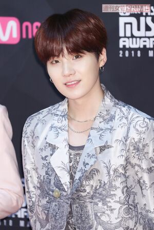 SUGA　撮影／吉岡竜紀