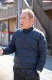 3月14日の昼間、直撃取材に答える小峰和美氏