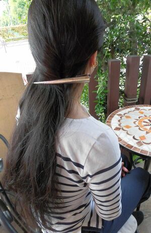 吉田さんは息子と撮った入学式のときの写真を大事に手帳に挟んでいた