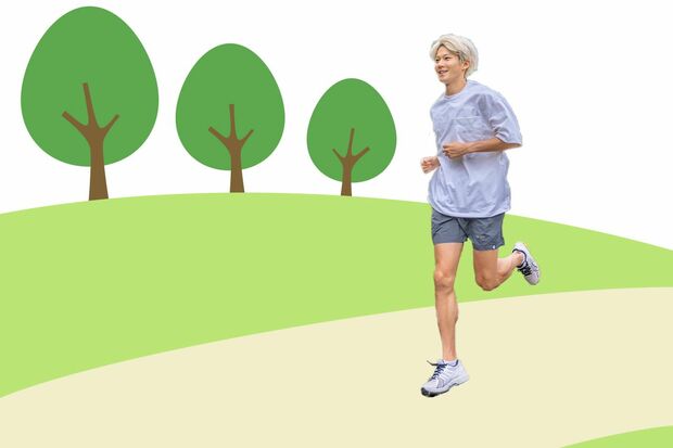 笑顔でランニングする三津家さん　写真／本人提供