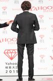 スーツ越しに筋肉がパンパン。腹筋、背筋、腕立ては毎日だそう　撮影／矢島泰輔