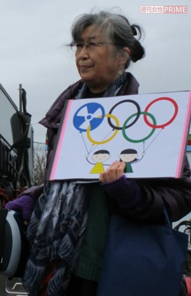 復興五輪へのスタンディング抗議で武藤さんは、土壌汚染や汚染水の問題、避難者たちの窮状を訴えた