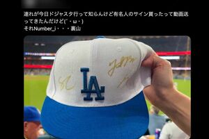 number_iのサインをもらったというファン（Xより、編集部一部加工）