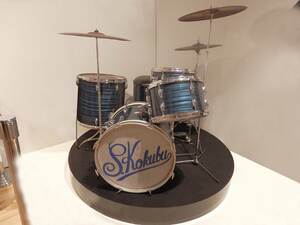 スターの地位を不動のものにした映画『嵐を呼ぶ男』で使用されたドラムセット。劇中のドラム合戦で、「おいらはドラマー」と歌い出す場面は今でも語り継がれる名シーン 写真提供/日活、石原プロモーション