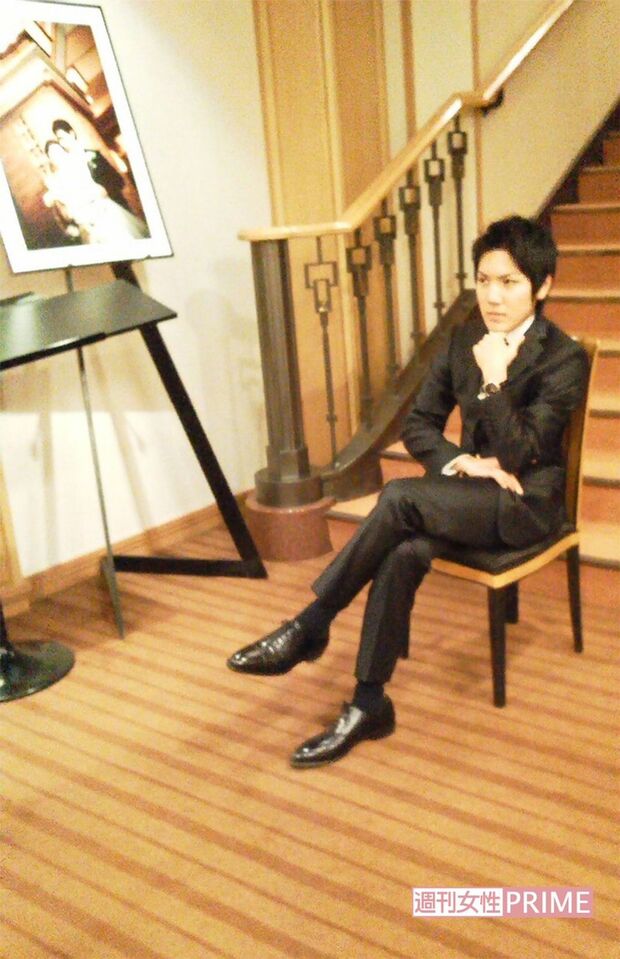 圭さんが成人したときの記念撮影。竹田さんがプレゼントした靴を履いて撮影に臨んだ