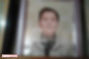 容疑者の母の遺影。事件1か月前に88歳で亡くなった