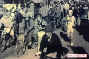 前を走る選手を抜いた直後の夏苅さん。沿道の応援を一身に浴びた