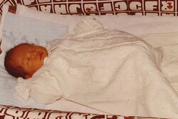 赤ん坊のころの奈央さん。なんの不安もない笑顔