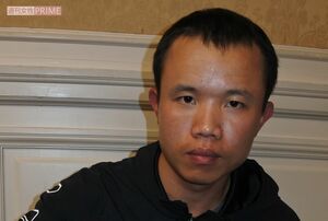 黄世護さんは生々しい傷痕を見せてくれた