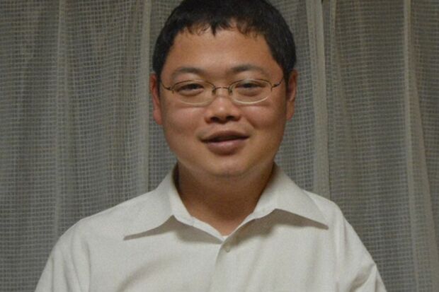 書道展で受賞した奥容疑者（毎日新聞より）