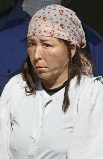 吉野千鶴容疑者＝22日午前、警視庁大井署（写真/共同通信社）