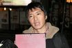 直撃取材に応える長井秀和
