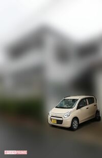 中学校のそばにある容疑者の自宅。止めてある車の中で行為に及んだようだ