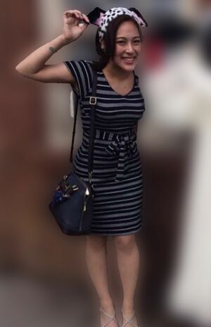 タイトなワンピースを着る佐久間清来容疑者(本人のフェイスブックより、画像は編集部で一部加工)